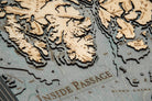 Inside Passage, Alaska 3D layered wood map in laser-cut Baltic birch, shown framed against a light wall