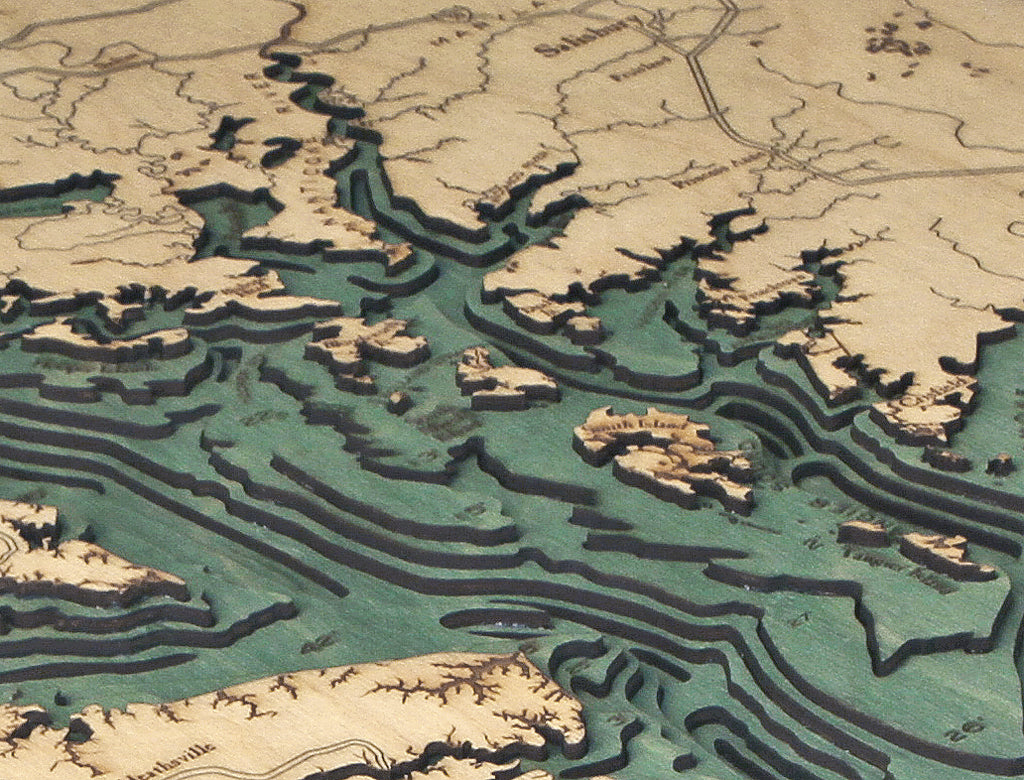 Chesapeake Bay, Maryland 3D layered wood map in laser-cut Baltic birch, shown framed against a light wall