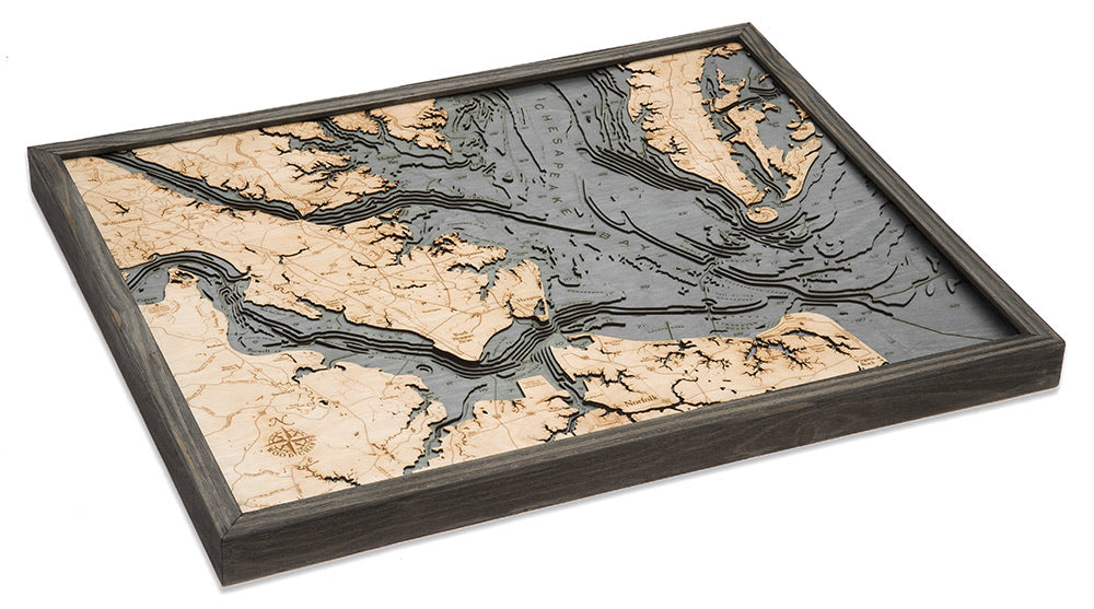 Norfolk, Virginia 3D layered wood map in laser-cut Baltic birch, shown framed against a light wall