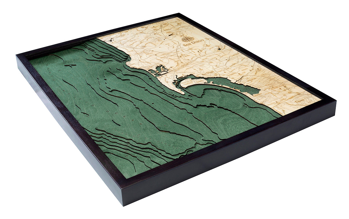 San Diego, California 3D layered wood map in laser-cut Baltic birch, shown framed against a light wall