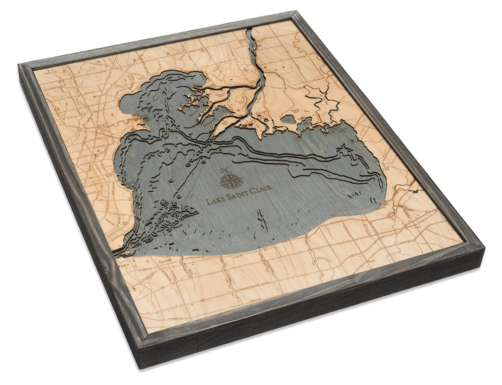 Lake St. Clair, Michigan 3D layered wood map in laser-cut Baltic birch, shown framed against a light wall