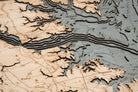 Norfolk, Virginia 3D layered wood map in laser-cut Baltic birch, shown framed against a light wall