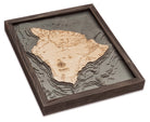 The Big Island, Hawaii 3D layered wood map in laser-cut Baltic birch, shown framed against a light wall