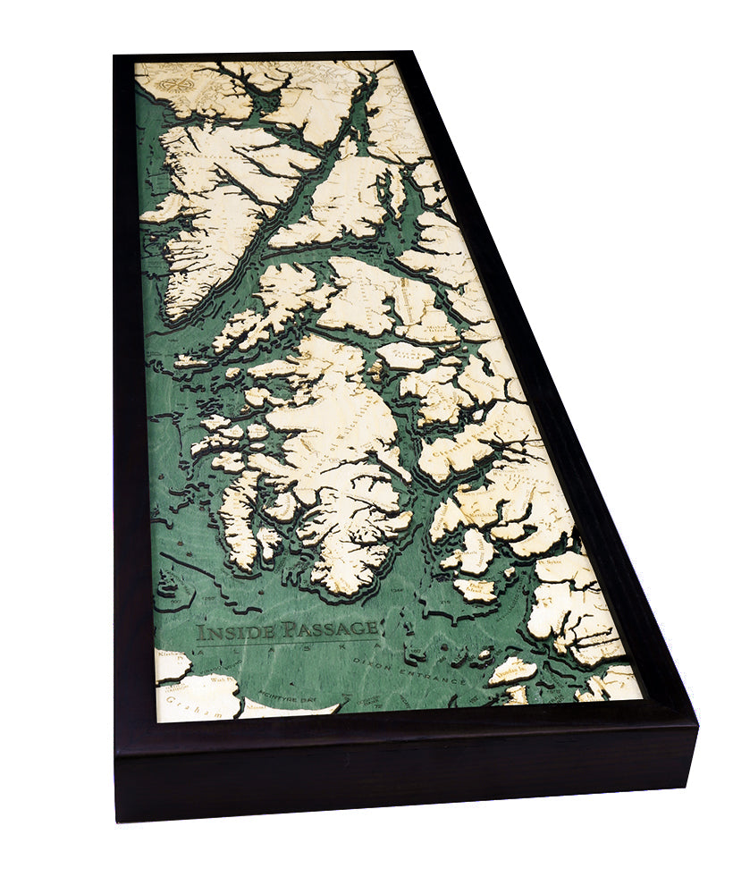 Inside Passage, Alaska 3D layered wood map in laser-cut Baltic birch, shown framed against a light wall