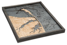 Rumson, New Jersey 3D layered wood map in laser-cut Baltic birch, shown framed against a light wall