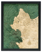 Carmel & Monterey, California 3D layered wood map in laser-cut Baltic birch, shown framed against a light wall